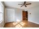 Bright bedroom with hardwood floors and built-in closet at 3766 Citation Dr, Decatur, GA 30034