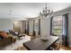 Bright dining room with hardwood floors and large windows at 3766 Citation Dr, Decatur, GA 30034