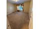 Well-lit bedroom with carpeted floors and window coverings at 1833 River Shoals Ne Dr, Conyers, GA 30012