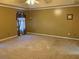 Large main bedroom with high ceilings, neutral walls, and plush carpeting at 1833 River Shoals Ne Dr, Conyers, GA 30012