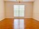 Elegant dining room with hardwood floors and a chandelier at 2322 Luther Sw Ter, Marietta, GA 30064