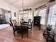 Bright dining room with hardwood floors and built-in shelving at 1473 Mahogany Chase Nw, Acworth, GA 30101