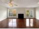 Living room features hardwood floors, fireplace and access to patio at 3781 Harvest Dr, Decatur, GA 30034