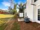 Private backyard patio with grass and trees at 3781 Harvest Dr, Decatur, GA 30034