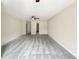 Spacious bedroom with gray carpet and ceiling fan at 3781 Harvest Dr, Decatur, GA 30034