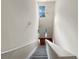 View from upstairs looking down a carpeted staircase at 3781 Harvest Dr, Decatur, GA 30034