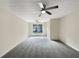 Spacious bedroom with ceiling fan and carpeting at 3781 Harvest Dr, Decatur, GA 30034