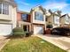 Two story townhome with two car garage and landscaping at 3781 Harvest Dr, Decatur, GA 30034