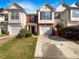 Two story townhome with two car garage and landscaping at 3781 Harvest Dr, Decatur, GA 30034