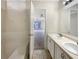 Bathroom with double vanity, bathtub, and view of bedroom at 3781 Harvest Dr, Decatur, GA 30034