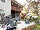 Brick patio with fire pit and seating area at 304 Gardens Of Harmony Dr, Canton, GA 30115