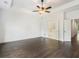 Large bedroom with hardwood floors and access to bathroom at 53 Honour Nw Ave, Atlanta, GA 30305