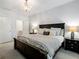 Spacious main bedroom with a king-size bed and ensuite bathroom at 53 Honour Nw Ave, Atlanta, GA 30305