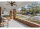 Spacious front porch with a view of the tree-lined street at 1841 Thompson Ave, Atlanta, GA 30344