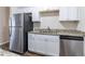 Modern kitchen with stainless steel appliances and granite countertops at 3851 Bonnie Se Ln, Atlanta, GA 30354