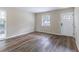 Living room with wood-look floors and neutral color scheme at 3851 Bonnie Se Ln, Atlanta, GA 30354