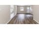 Spacious living area with wood-look floors and lots of natural light at 3851 Bonnie Se Ln, Atlanta, GA 30354