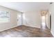 Bright living room featuring wood-look floors and an open floor plan at 3851 Bonnie Se Ln, Atlanta, GA 30354