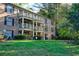 Two-story building with balconies and landscaping at 3650 Ashford Dunwoody Ne Rd # 802, Brookhaven, GA 30319