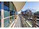 Private balcony with city views and modern metal railing at 700 Park Regency Ne Pl # 1504, Atlanta, GA 30326