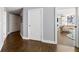 Long hallway with hardwood floors and neutral walls at 700 Park Regency Ne Pl # 1504, Atlanta, GA 30326