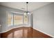 Bright dining room with hardwood floors and bay window at 562 Shoal Cir, Lawrenceville, GA 30046