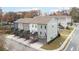 Exterior view of townhomes with private decks and attached garages at 3829 Oxford Cir, Doraville, GA 30340