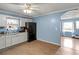 White kitchen with stainless steel appliances and light blue walls at 5861 Community Rd, Mableton, GA 30126