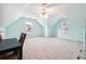 Large bedroom with light blue walls, carpet, and two windows at 2527 Sky Valley Dr, Dacula, GA 30019