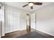 Spacious bedroom with hardwood floors, closet, and neutral walls at 4125 Hickory Dr, Powder Springs, GA 30127