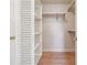 Walk-in closet with built-in shelving and hanging rods at 220 Spring Branch Dr, Canton, GA 30115