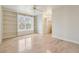 Bedroom with built-in shelves, window seat and hardwood floors at 220 Spring Branch Dr, Canton, GA 30115
