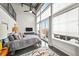 Bright bedroom with high ceilings and city views at 572 Edgewood Ne Ave # 306, Atlanta, GA 30312