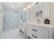 Updated bathroom with double vanity and glass shower at 513 Duke Dr, Marietta, GA 30066