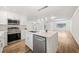 Open concept kitchen with island and stainless steel appliances at 513 Duke Dr, Marietta, GA 30066