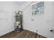 Laundry room with new flooring and shelving at 513 Duke Dr, Marietta, GA 30066