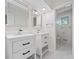 Double vanity bathroom with black and white tile floor at 513 Duke Dr, Marietta, GA 30066