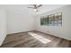 Spacious bedroom with wood-look floors and ceiling fan at 513 Duke Dr, Marietta, GA 30066