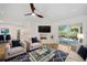 Bright living room with fireplace and sliding doors at 513 Duke Dr, Marietta, GA 30066
