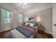 Bedroom with hardwood floors and natural light at 1397 Thomas Rd, Decatur, GA 30030