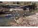 Shallow creek with a rocky ford at 1765 Holly Springs Ne Rd, Marietta, GA 30062
