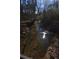 Small creek with sunlight reflecting on the water at 1765 Holly Springs Ne Rd, Marietta, GA 30062