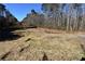 Wooded land with a cleared area, power lines visible in the background at 1765 Holly Springs Ne Rd, Marietta, GA 30062