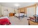 Spacious bedroom with a four-poster bed and ample closet space at 1765 Holly Springs Ne Rd, Marietta, GA 30062