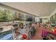 Covered porch with brick patio, showing various outdoor items at 1765 Holly Springs Ne Rd, Marietta, GA 30062