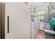 Laundry area with washer, dryer, and extra storage at 1765 Holly Springs Ne Rd, Marietta, GA 30062