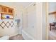 Simple bathroom with a bathtub and shower at 1765 Holly Springs Ne Rd, Marietta, GA 30062
