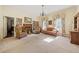 Spacious living room with fireplace, built-in shelving, and comfy seating at 1765 Holly Springs Ne Rd, Marietta, GA 30062
