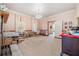 Spacious dining room with carpeting, a fireplace, and a chandelier at 1765 Holly Springs Ne Rd, Marietta, GA 30062