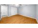 Simple bedroom with wood floors and double closets at 6851 Roswell Rd # O11, Atlanta, GA 30328